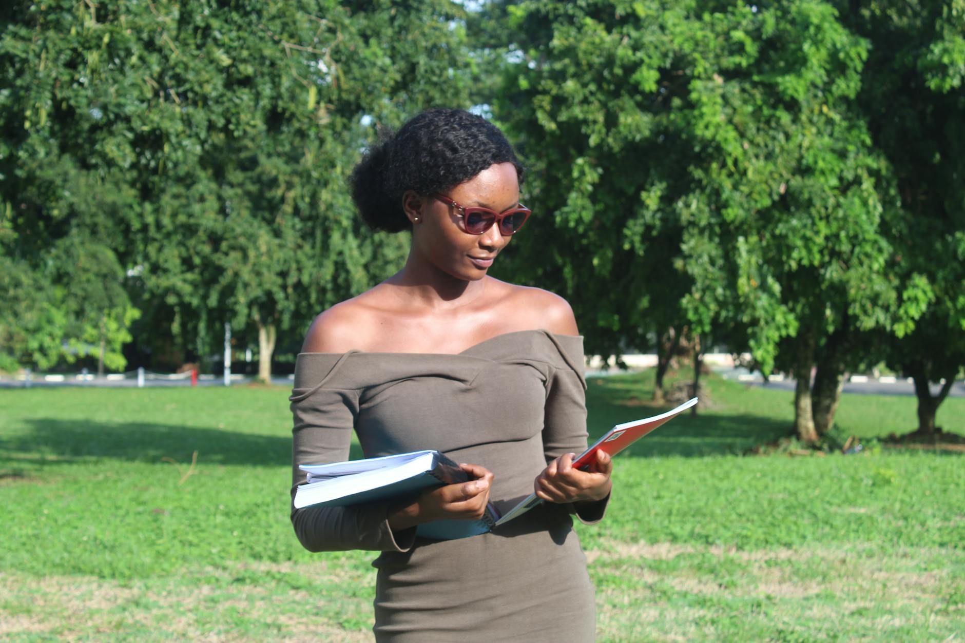 young woman studying outdoors in kumasi