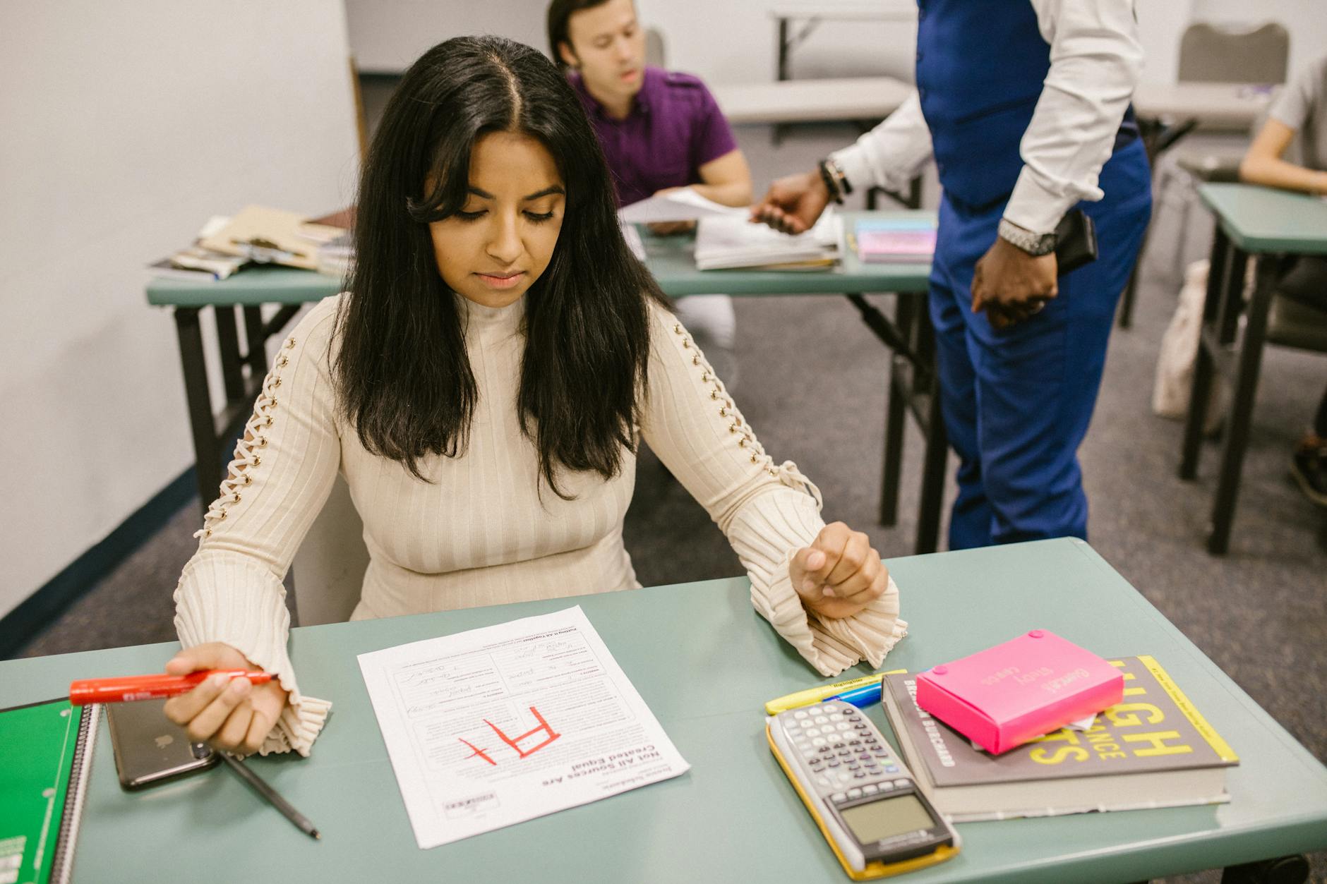 student getting a mark in her exam