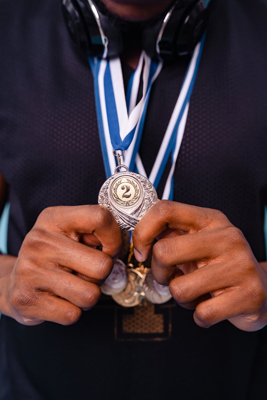 a person receiving medals