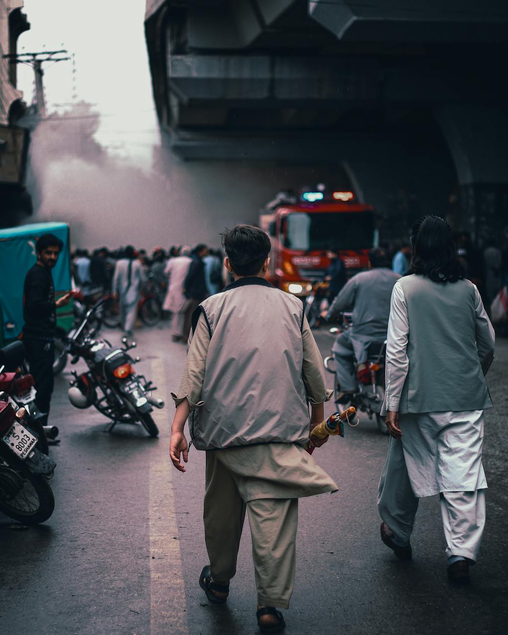 emergency scene with firefighters responding in peshawar