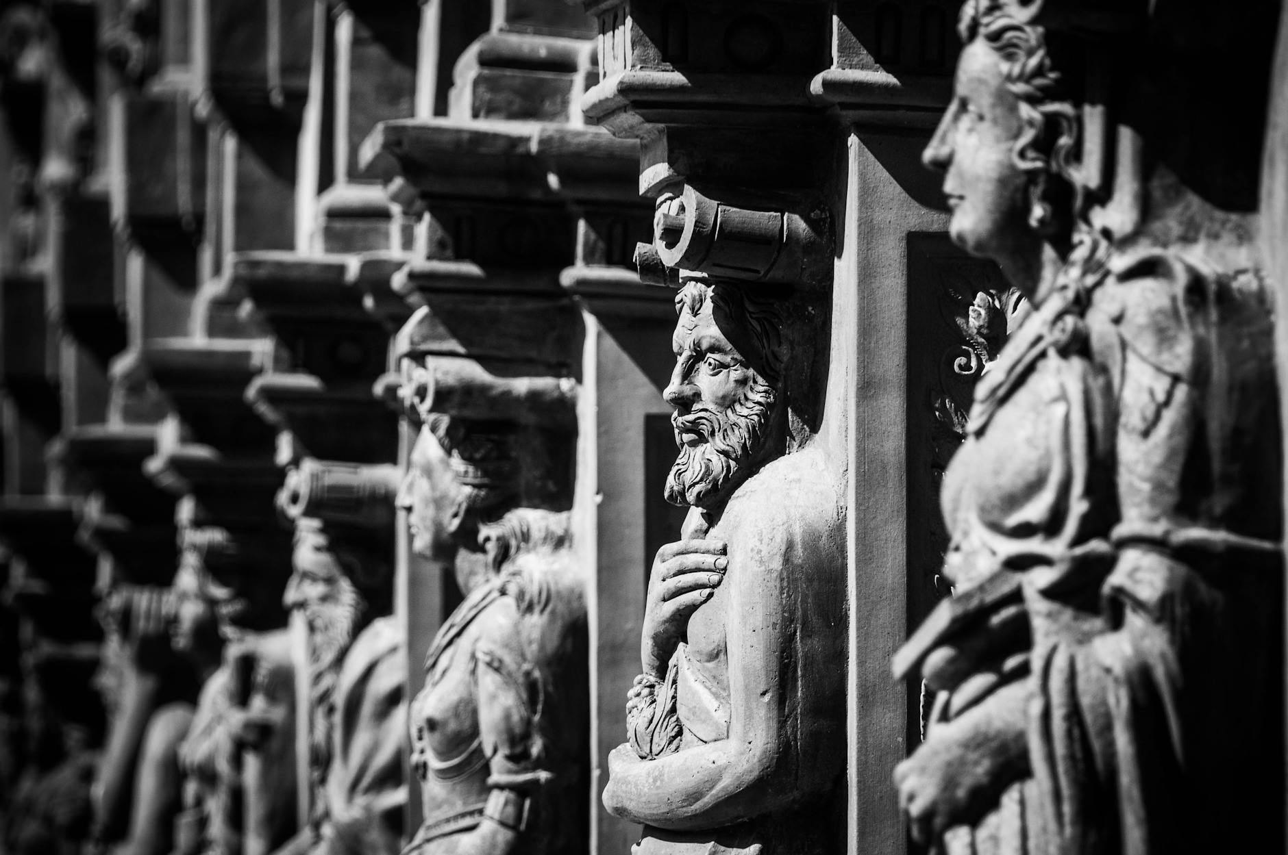 grayscale photography of statues