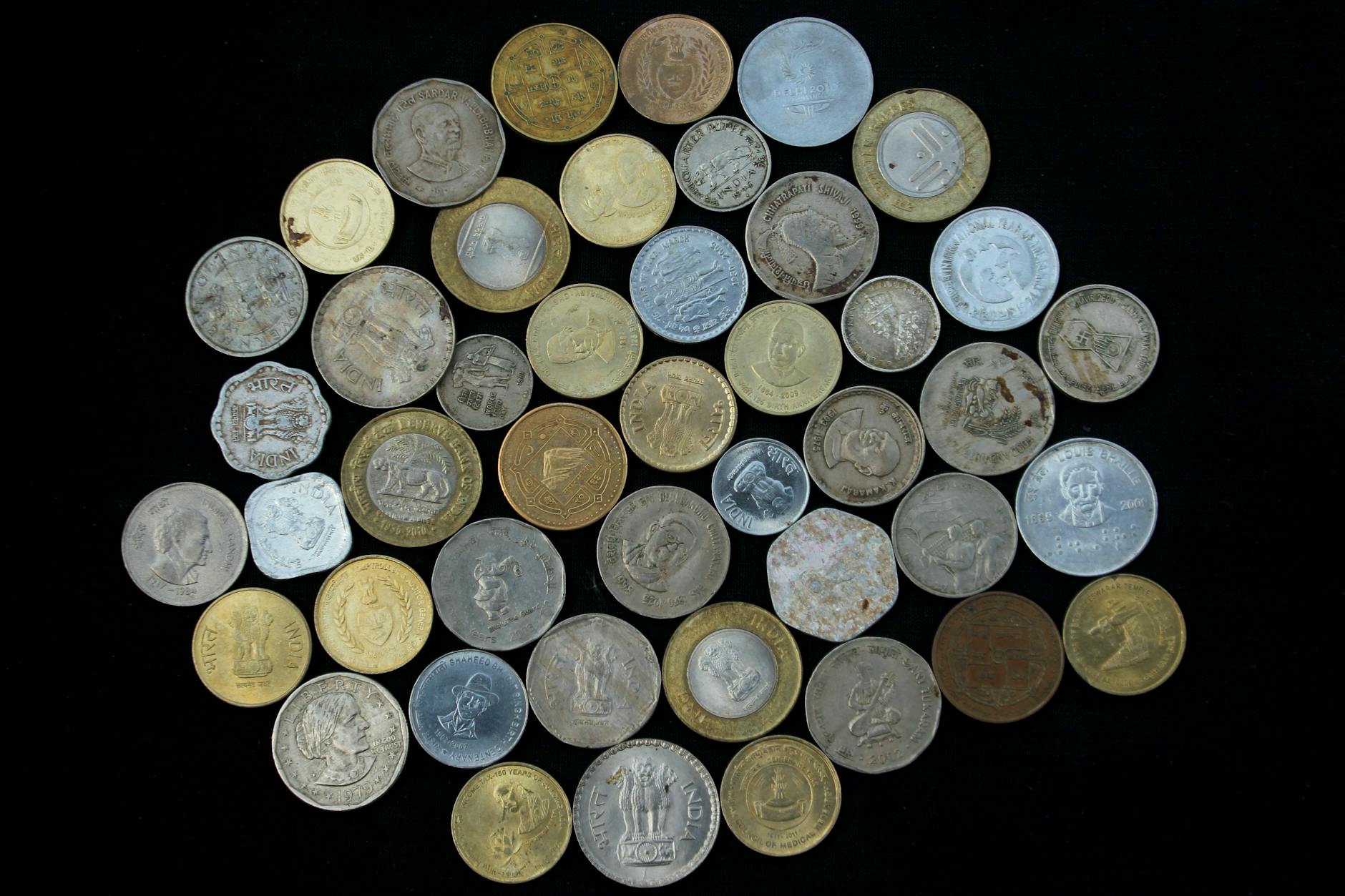 silver and gold round coins