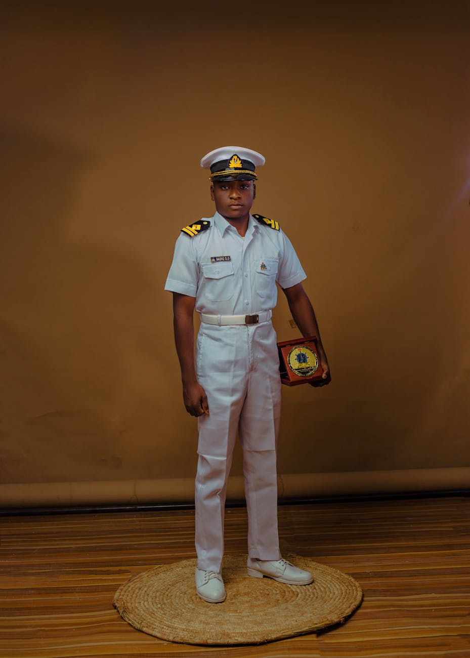 portrait of a navy officer in uniform with award
