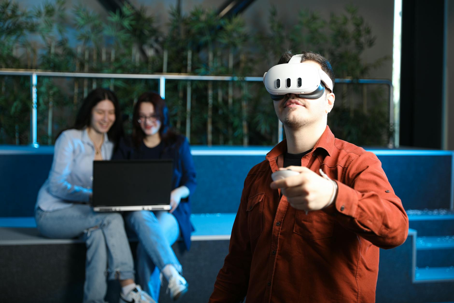 young adults engaging in virtual reality indoors