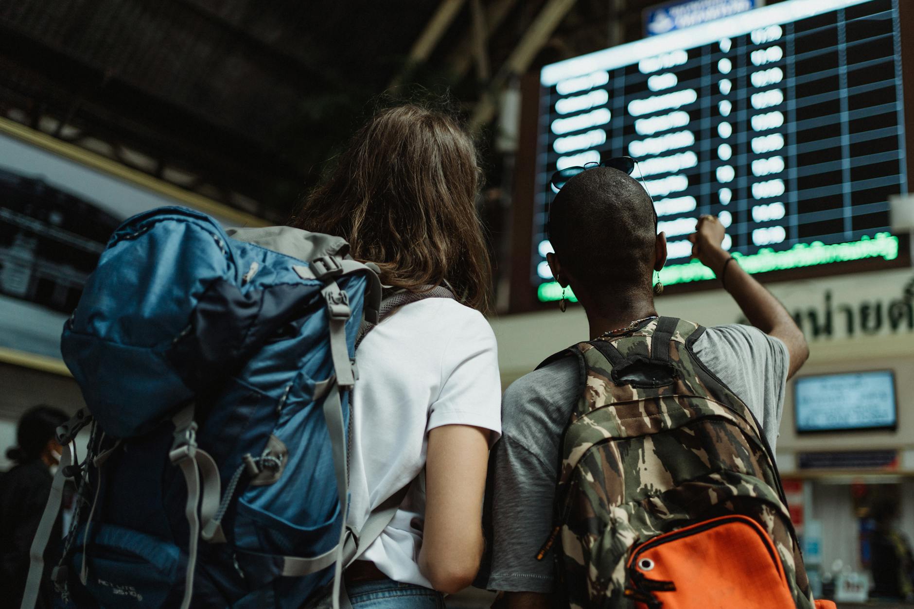 women looking at an information board