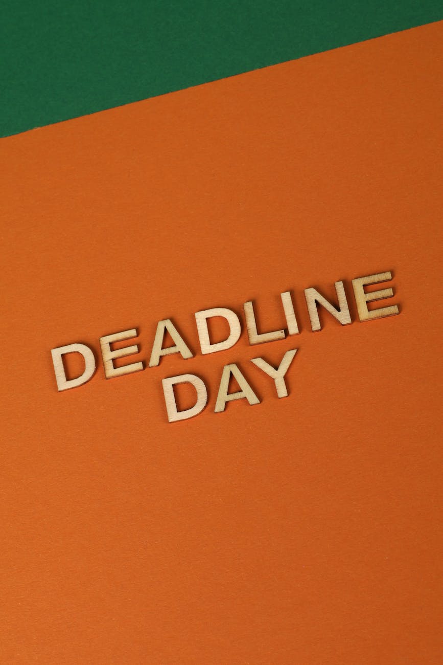 words from wooden letters on orange background