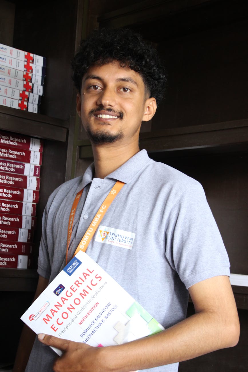 economics student in university library setting