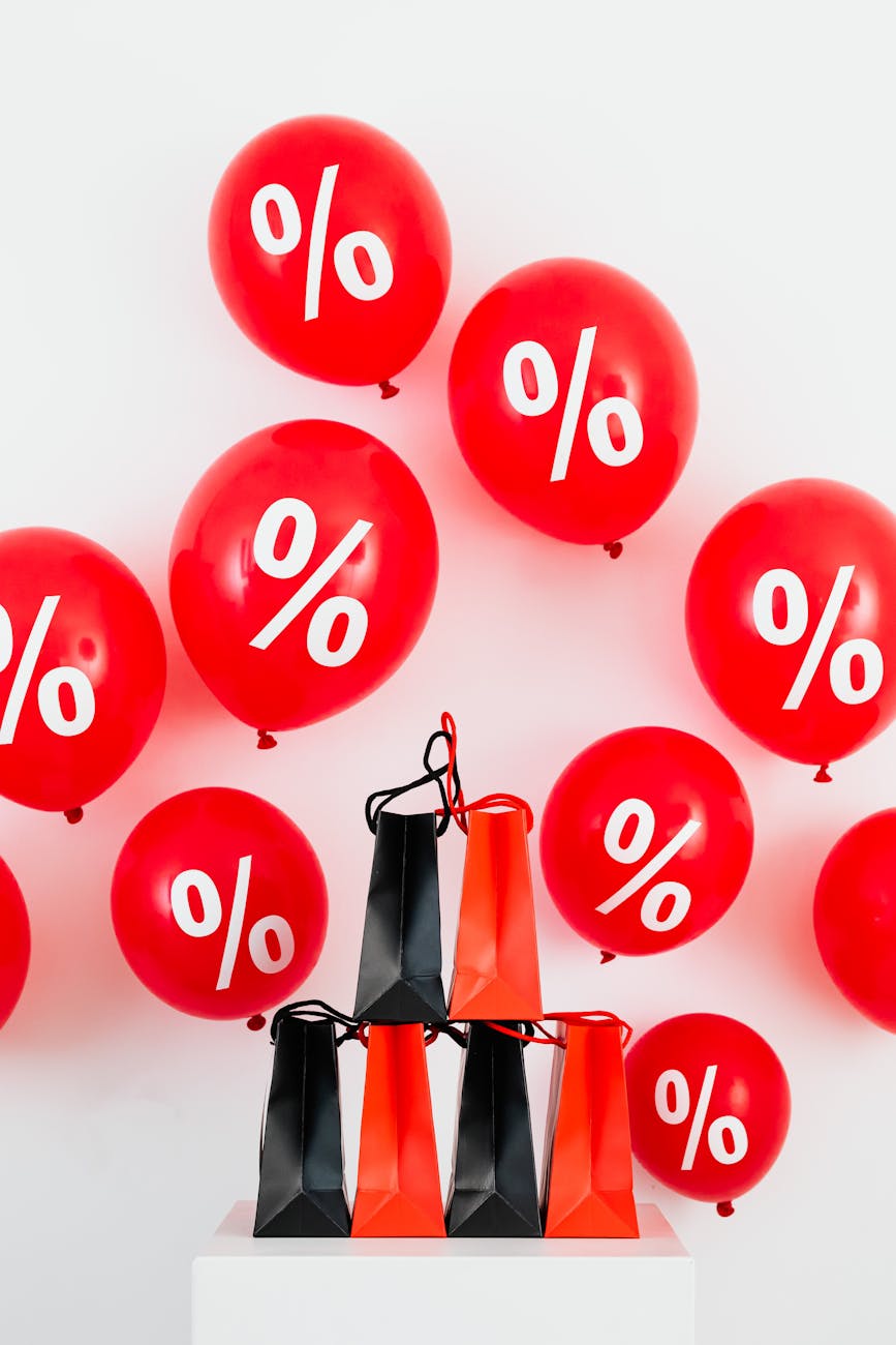 paper bags and balloons with percent sign