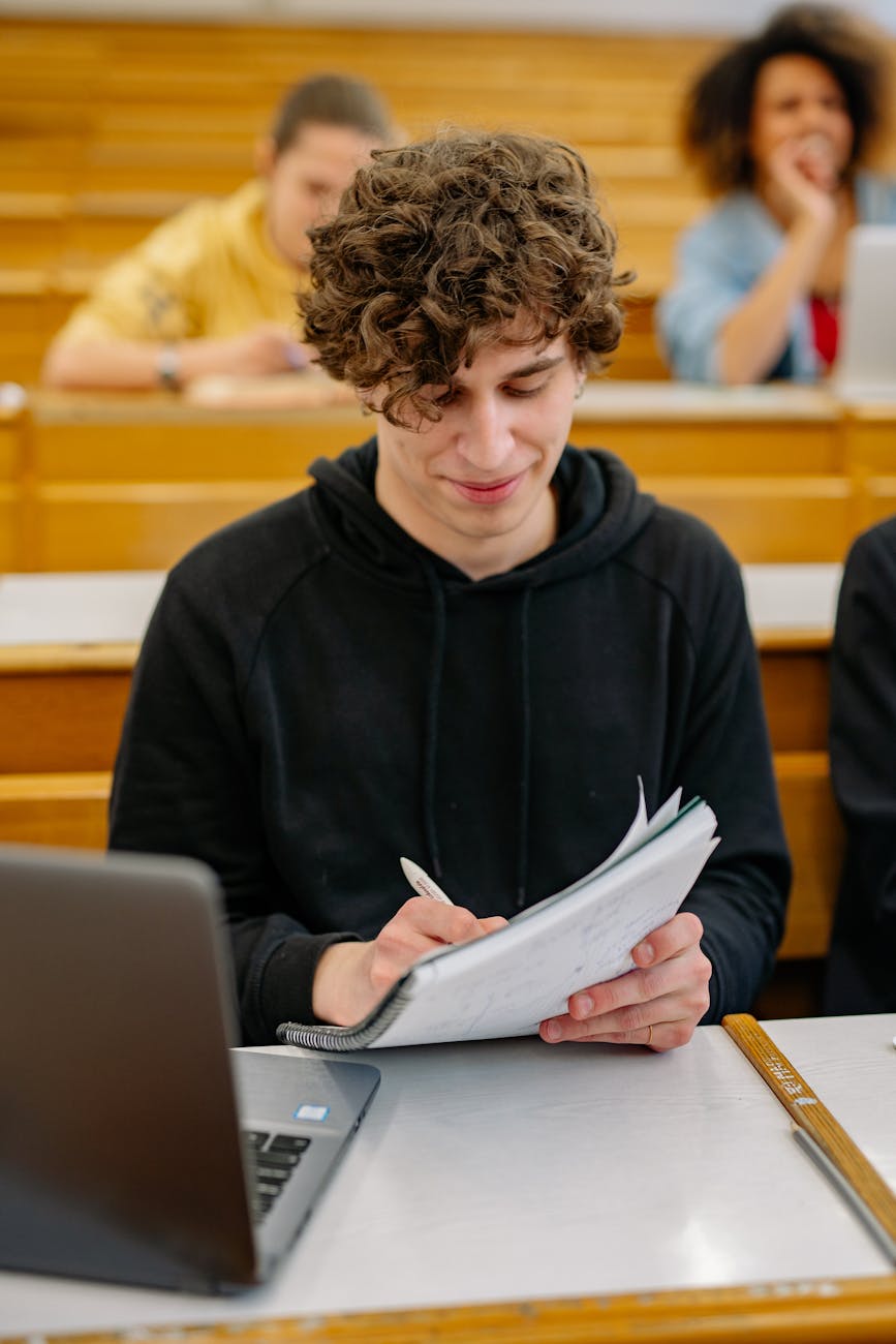 a man wearing a black hoodie sweater