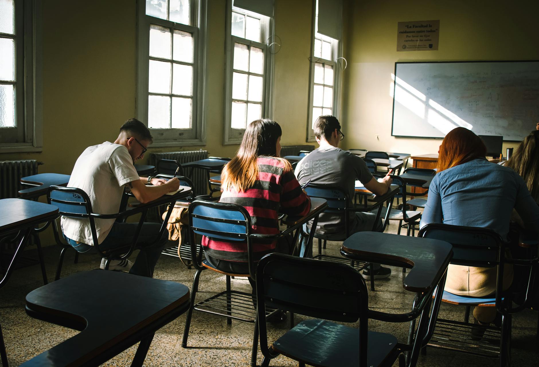 students concentrating in a classroom setting