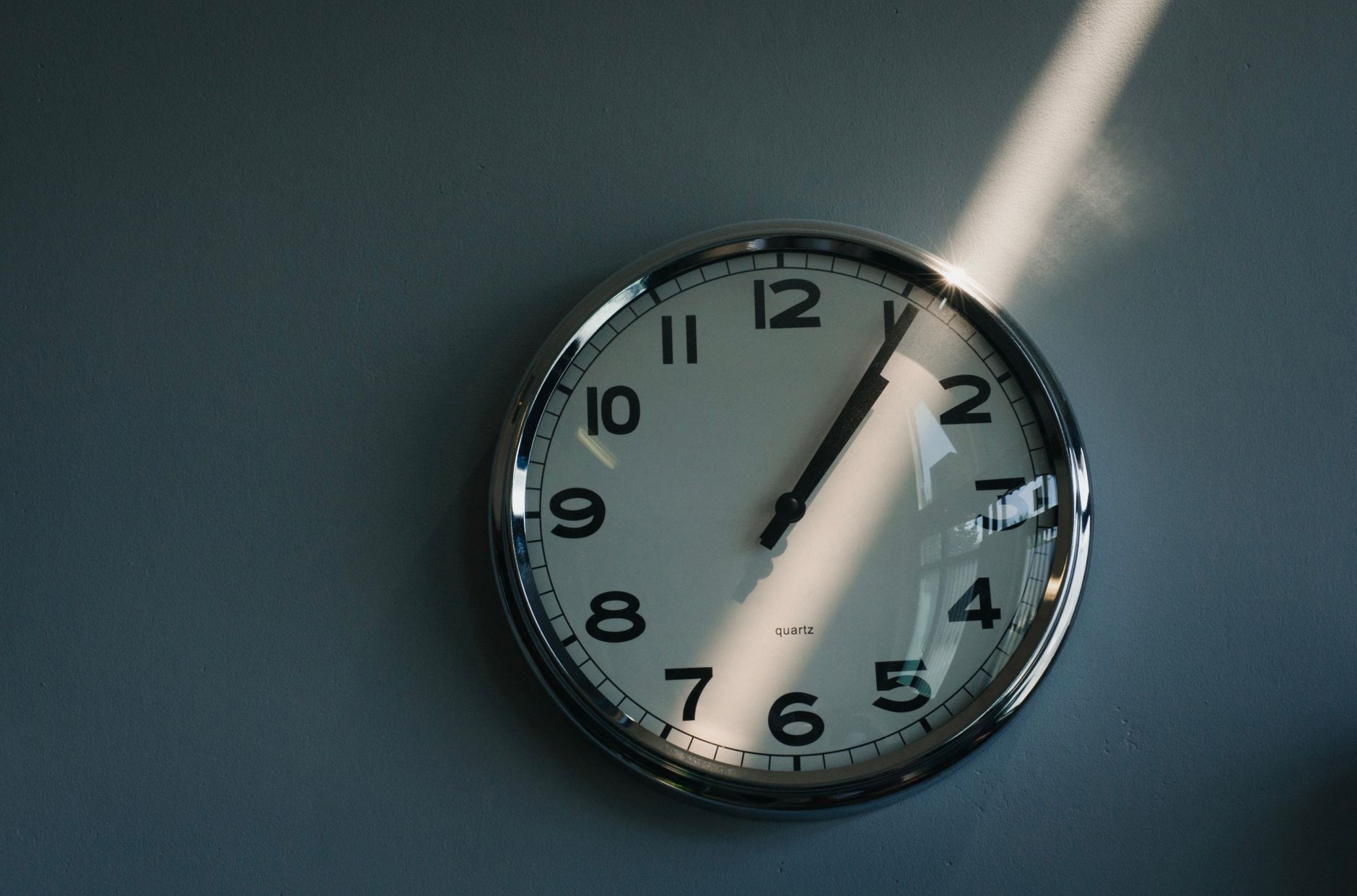 sunlight on the wall clock