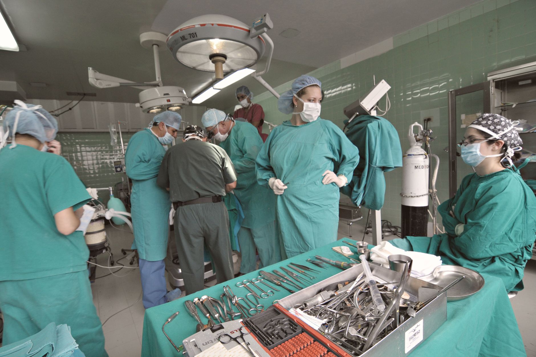 medical team performing surgery in operating room