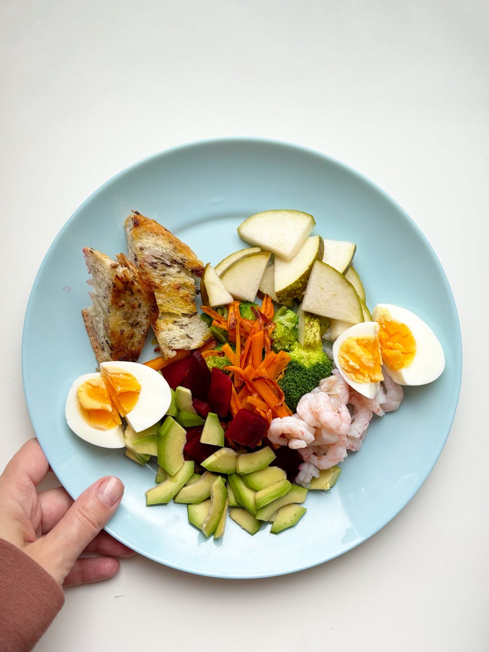 colorful healthy plate with eggs and shrimp