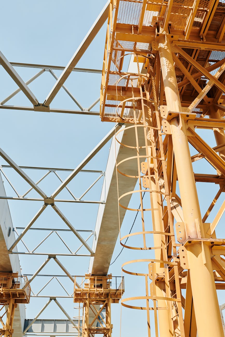 low angle shot of a metal construction under clear blue sky