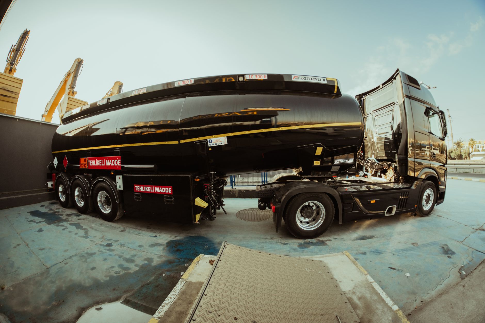 a large black tank truck