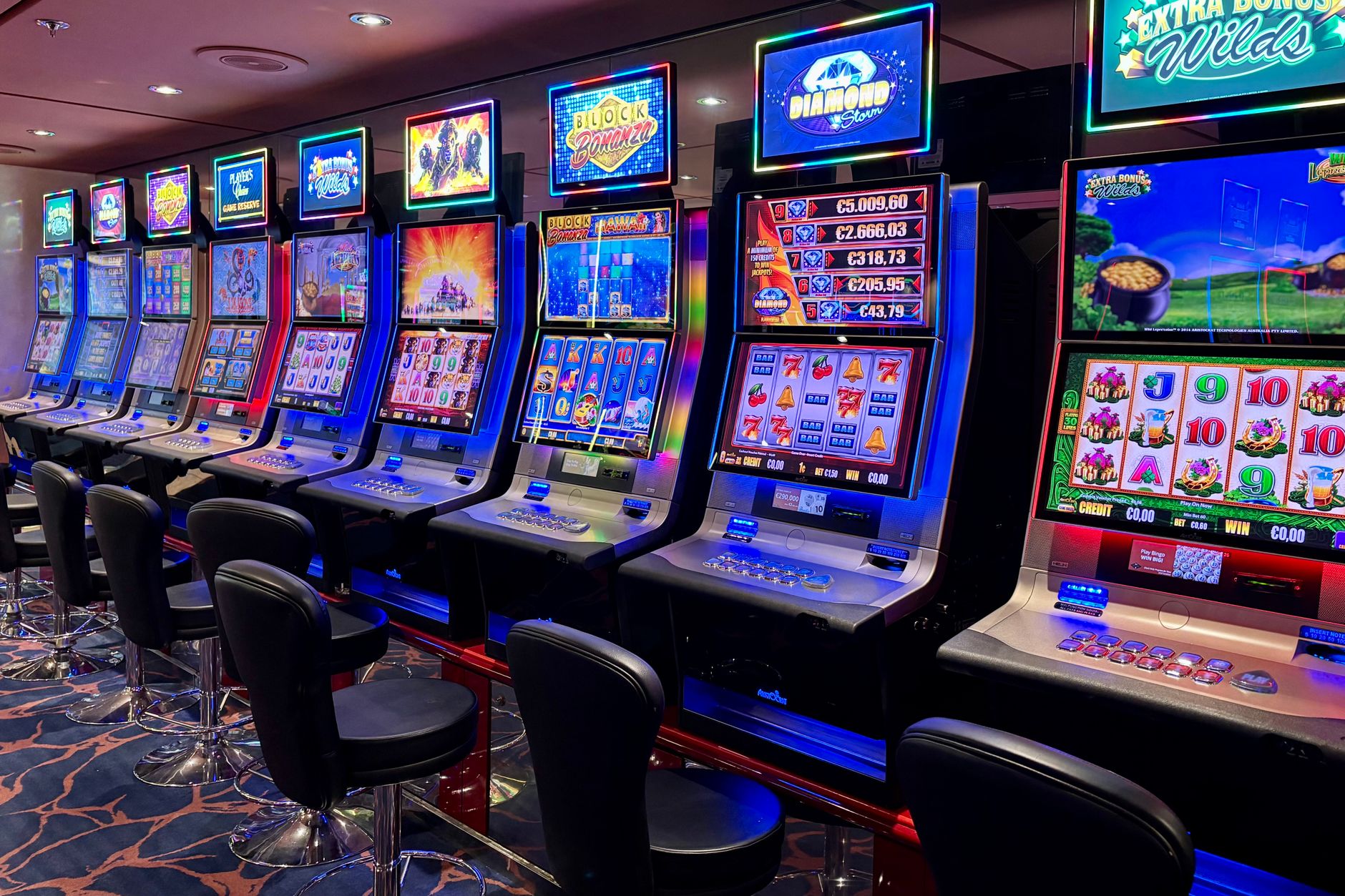 vibrant casino slot machines indoors at night
