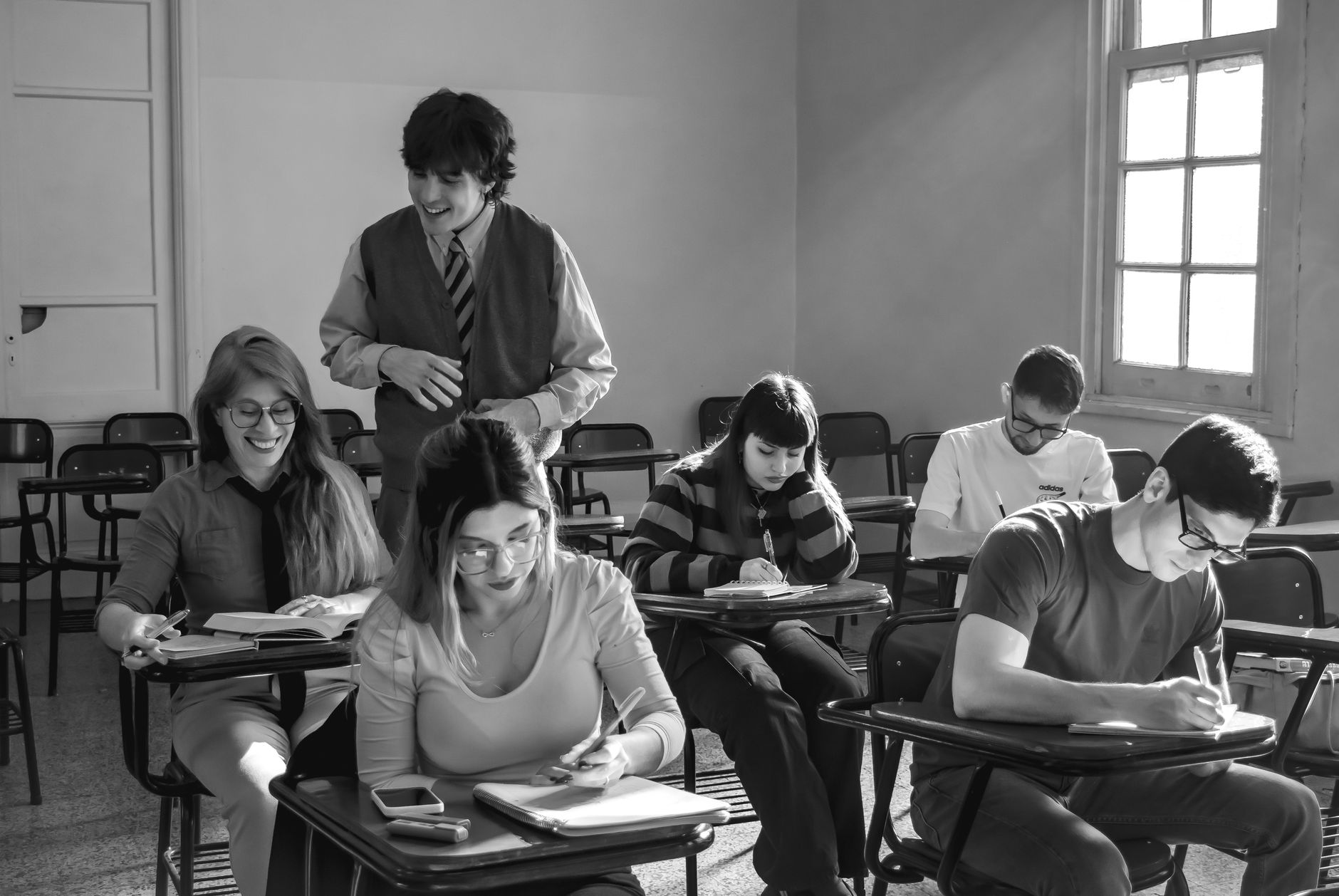 students and teacher in classroom setting
