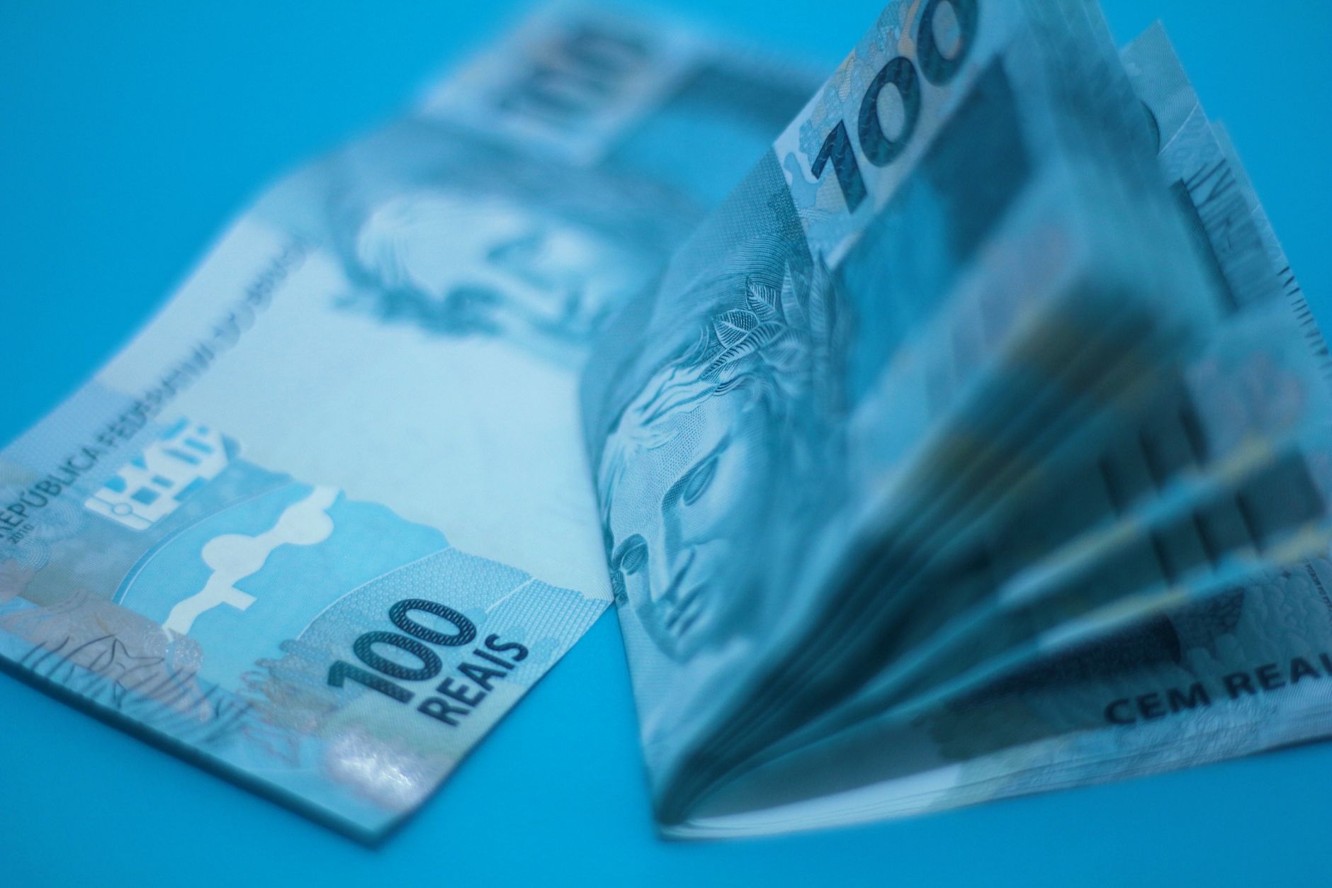 paper money on blue surface