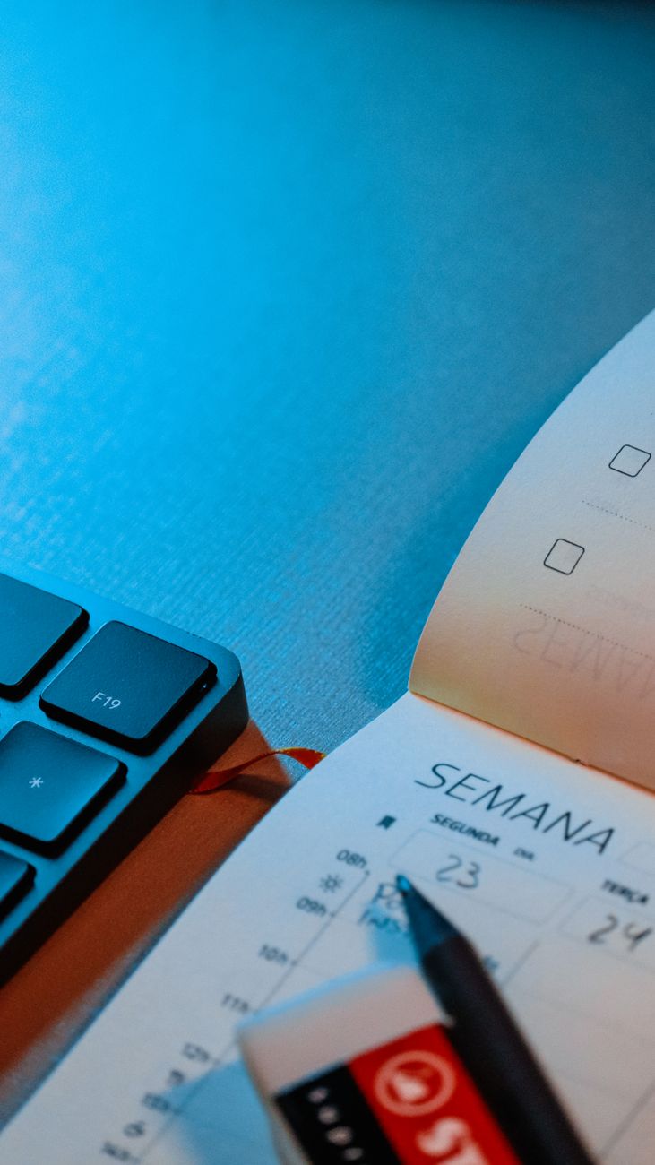 close up of a keyboard and a book