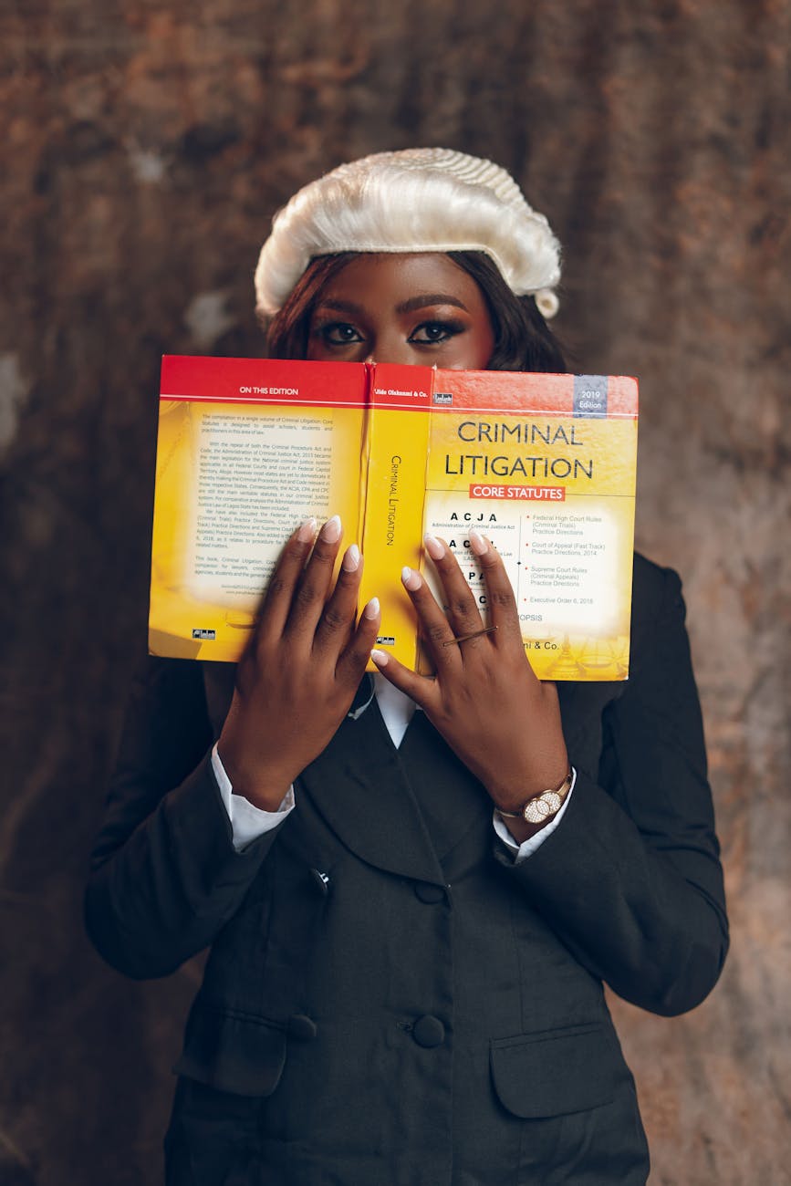 young lawyer reading criminal litigation book
