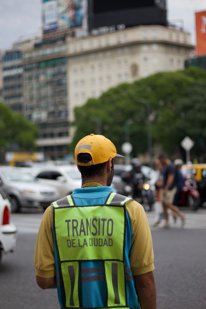 back view of a man wearing a vest